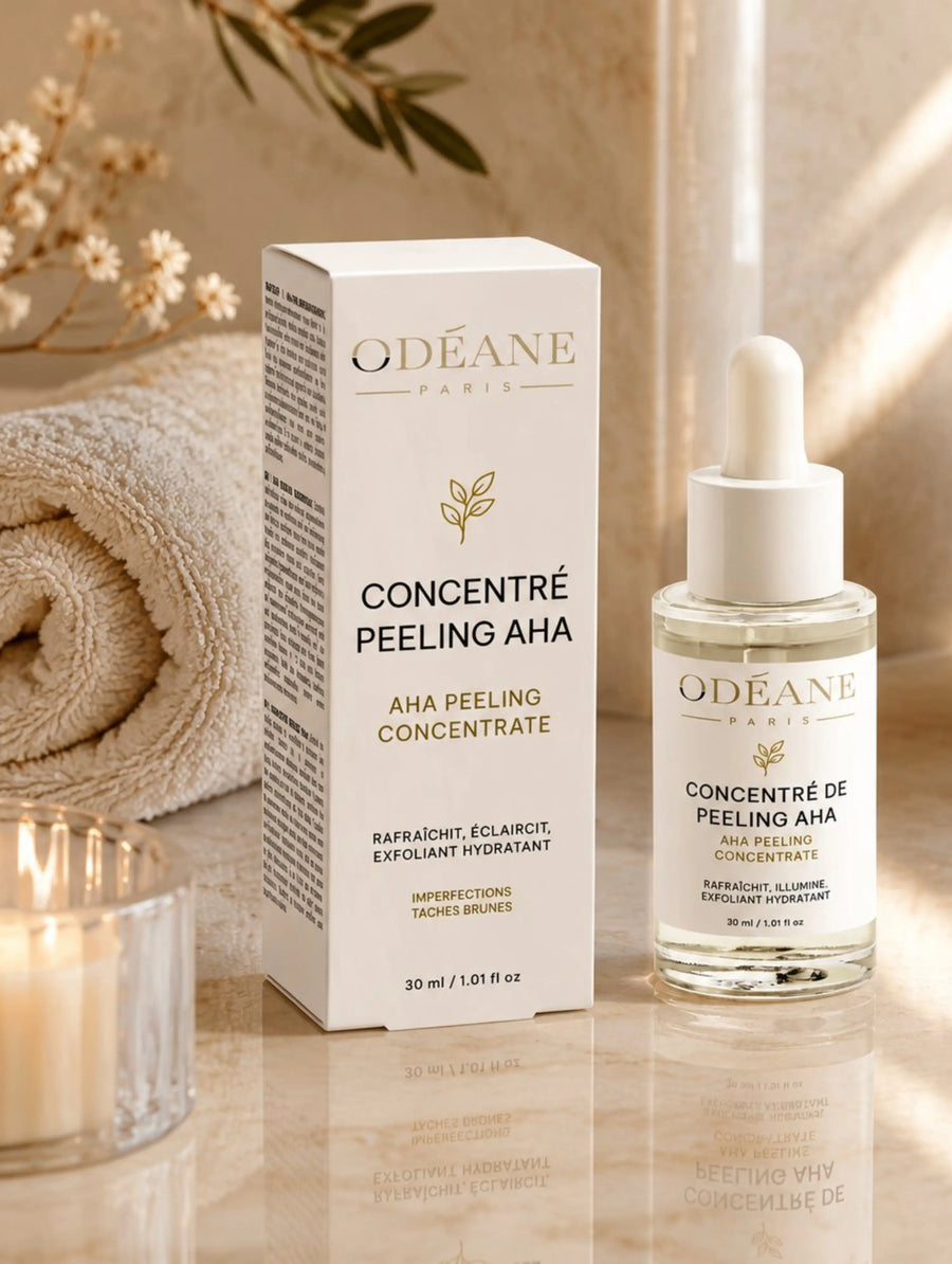 Concentré Peeling AHA ODÉANE, flacon et étui dans un décor de soin.
